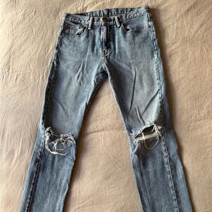Levi's Light Wash Ripped Knee Skinny Jeans